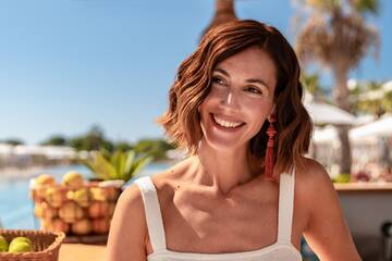 a woman smiling at the camera
