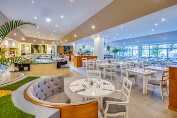 a room with tables and chairs