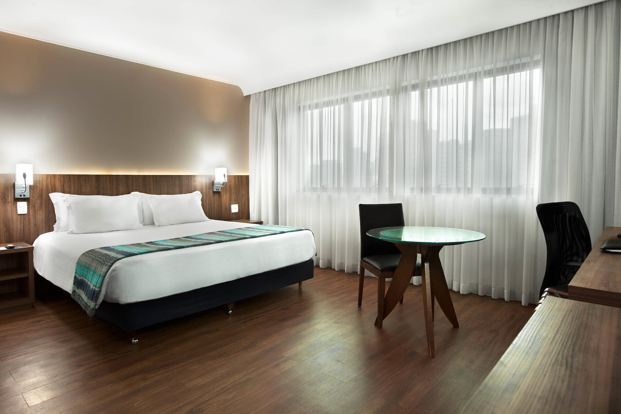 a room with a bed and a table