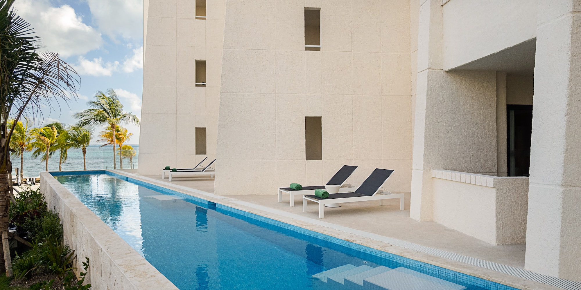 a pool next to a building