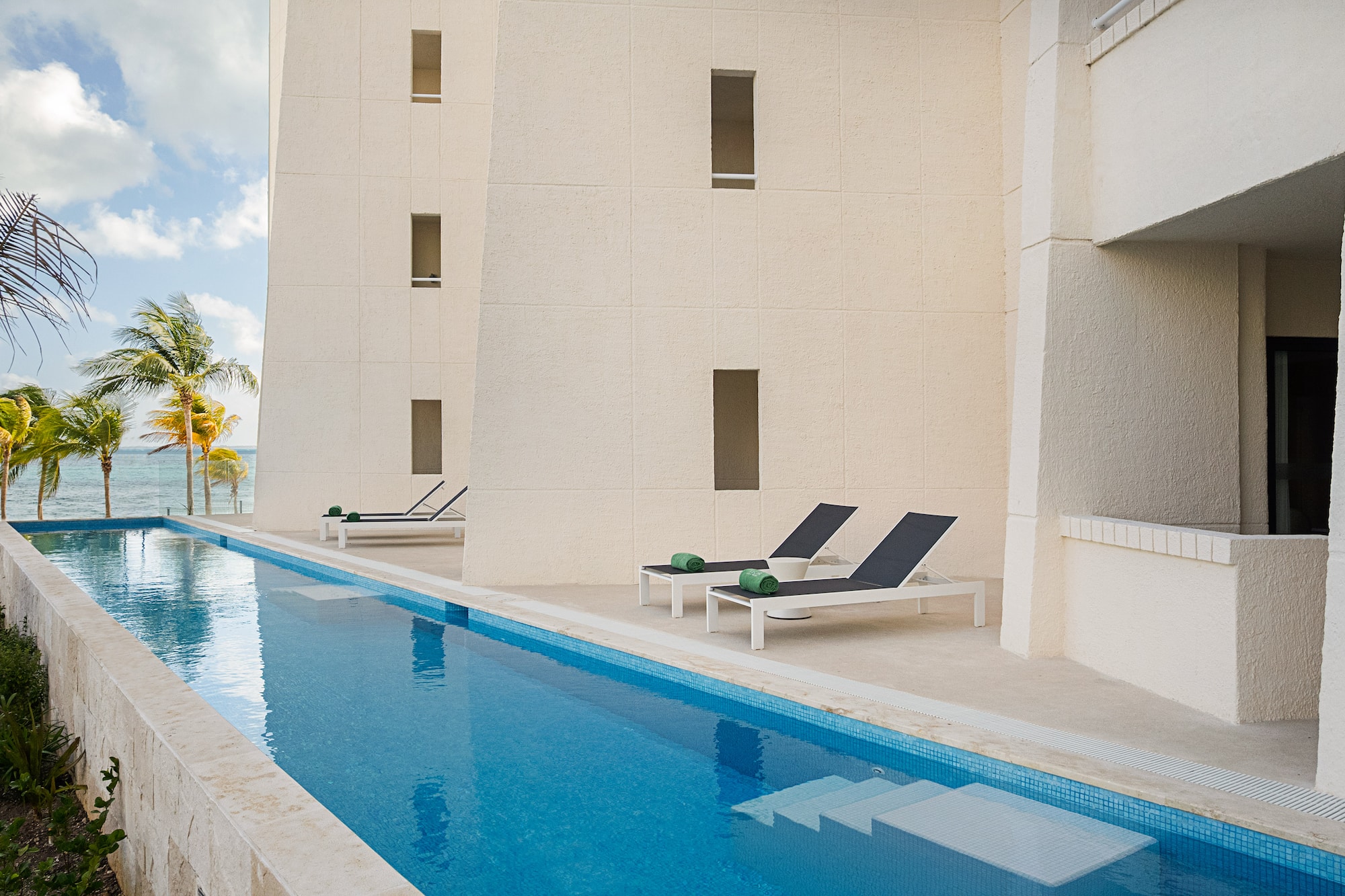 a pool next to a building
