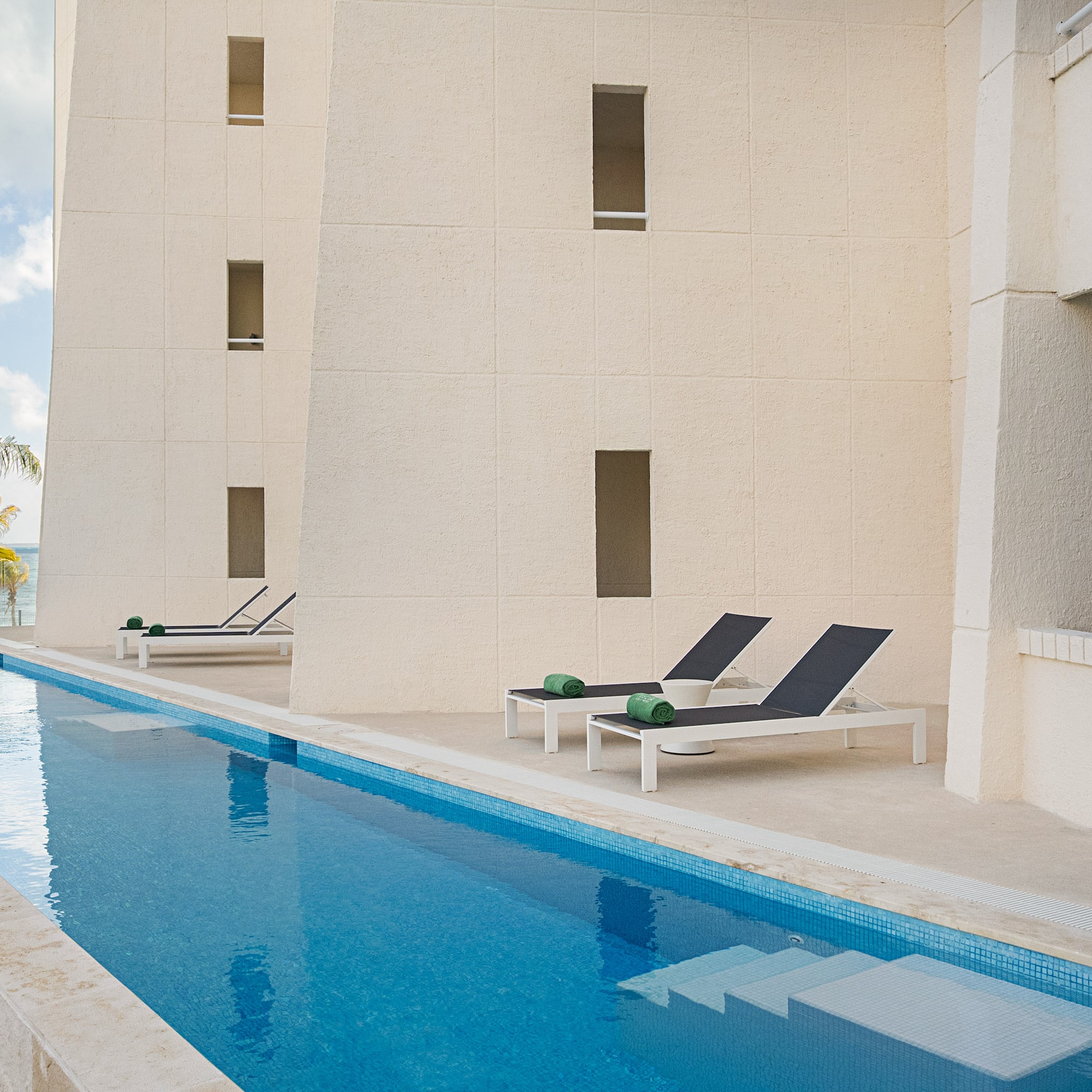 a pool next to a building