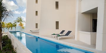 a pool next to a building