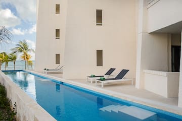 a pool next to a building