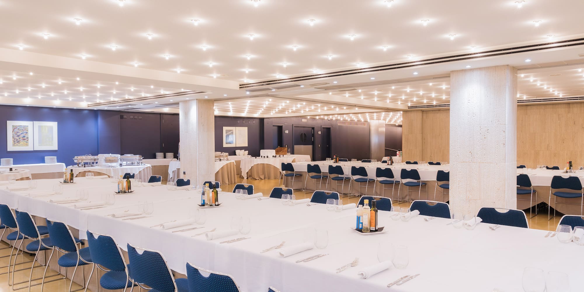 a large room with tables and chairs