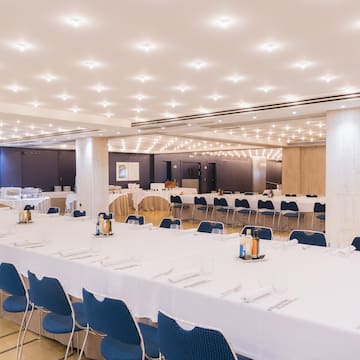 a large room with tables and chairs