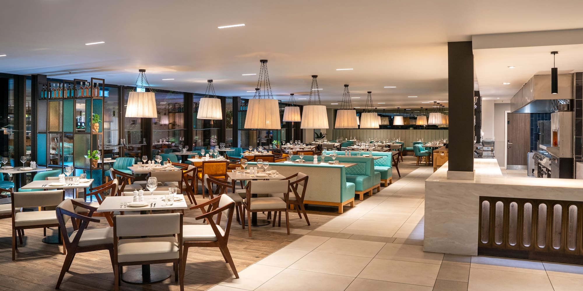 a restaurant with tables and chairs