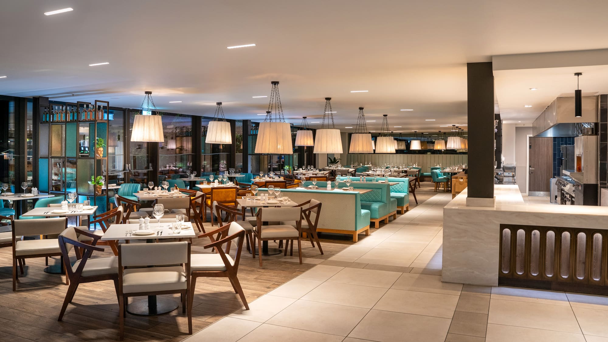 a restaurant with tables and chairs