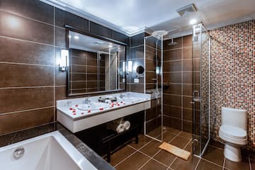 a bathroom with a shower and sink