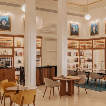 a room with tables and chairs