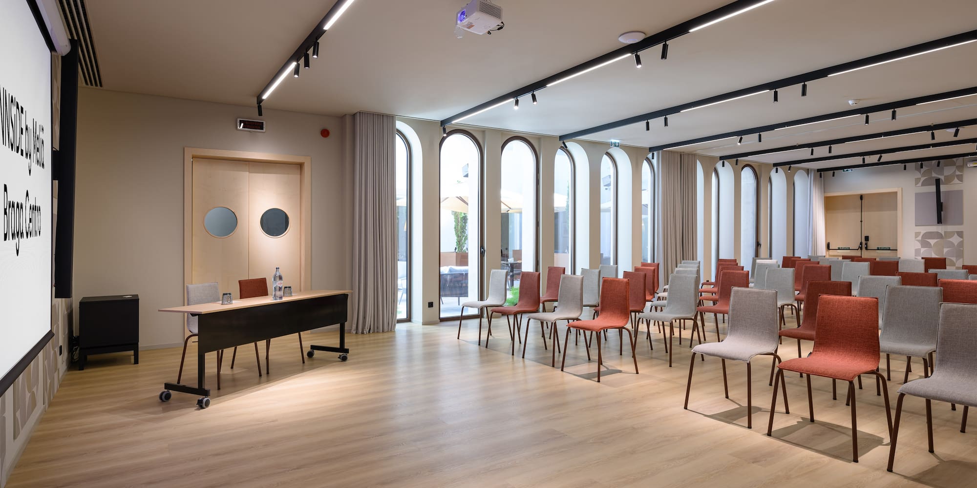 a room with chairs and tables