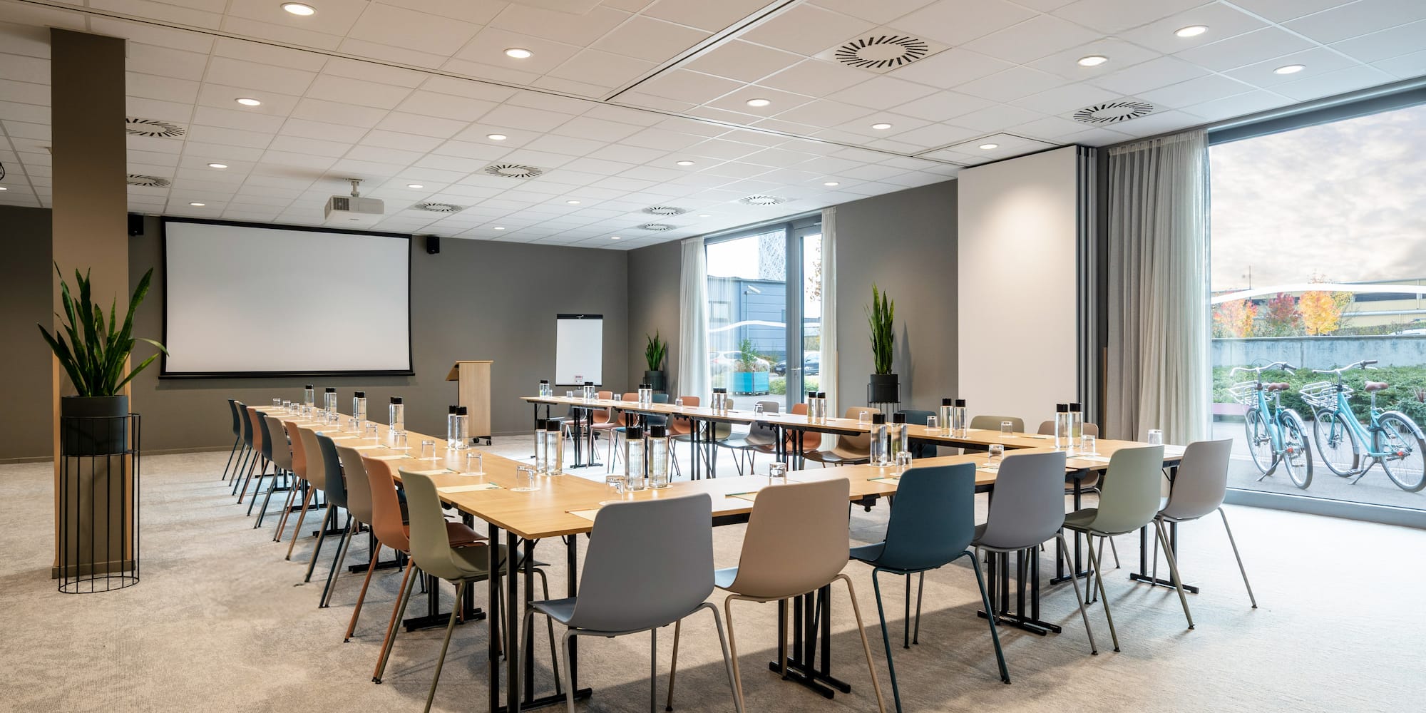 a room with a large table and chairs