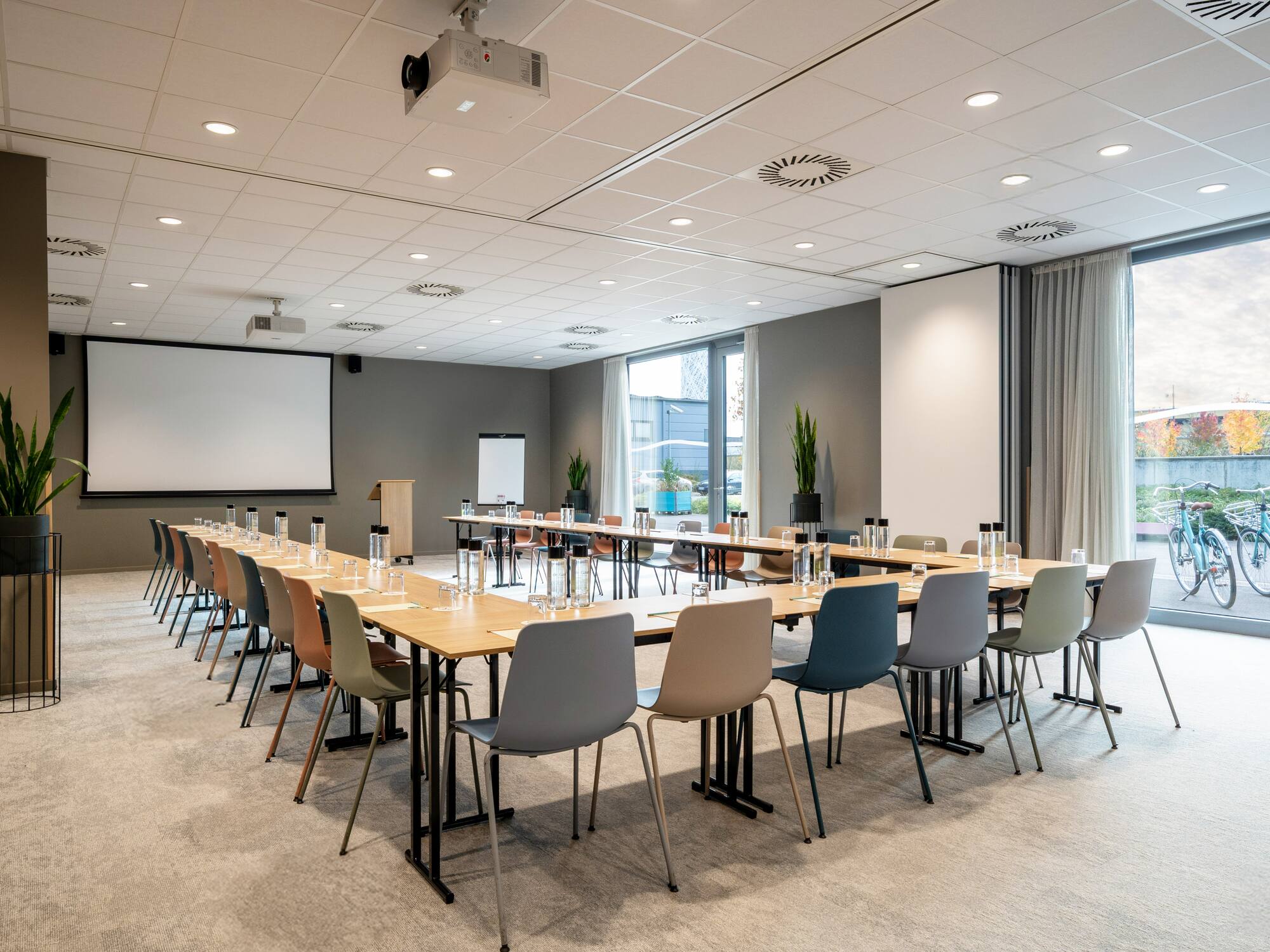 a room with a large table and chairs