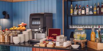 a coffee machine and a variety of dishes
