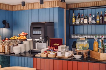 a coffee machine and a variety of dishes