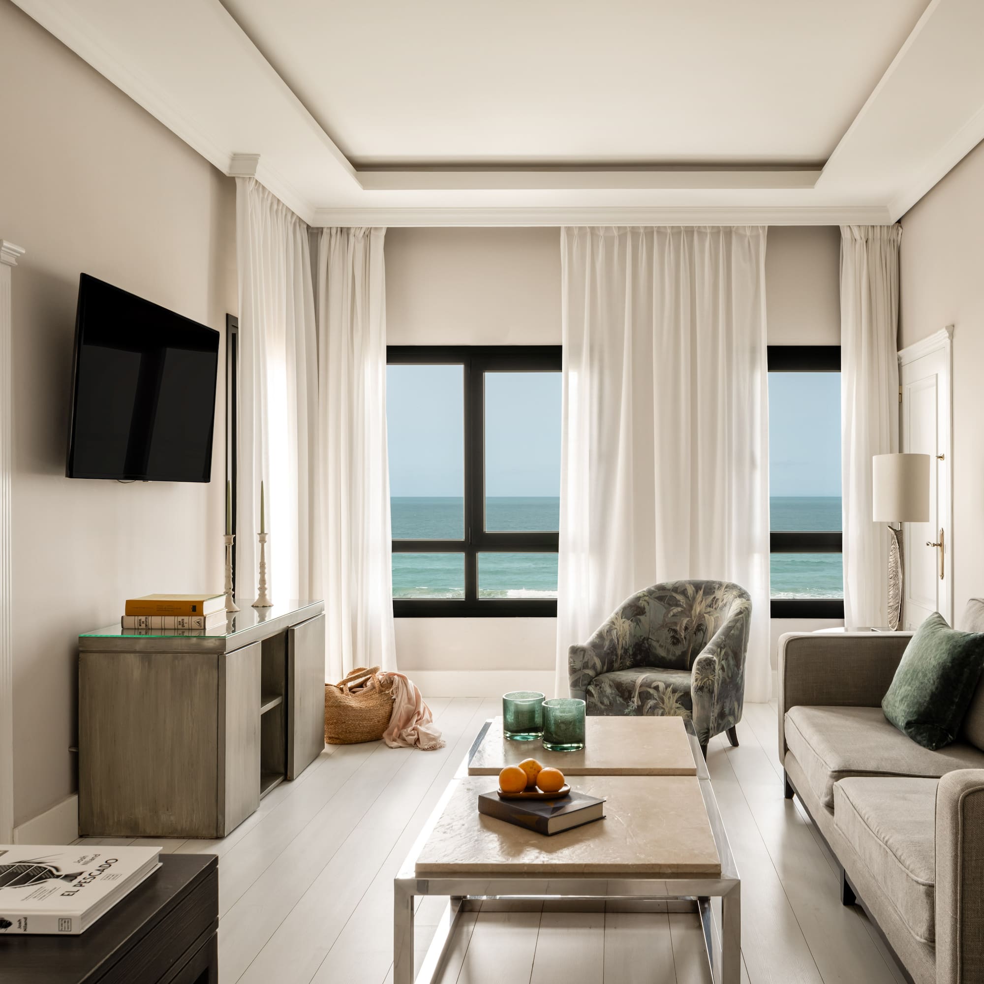 a living room with a television and a couch