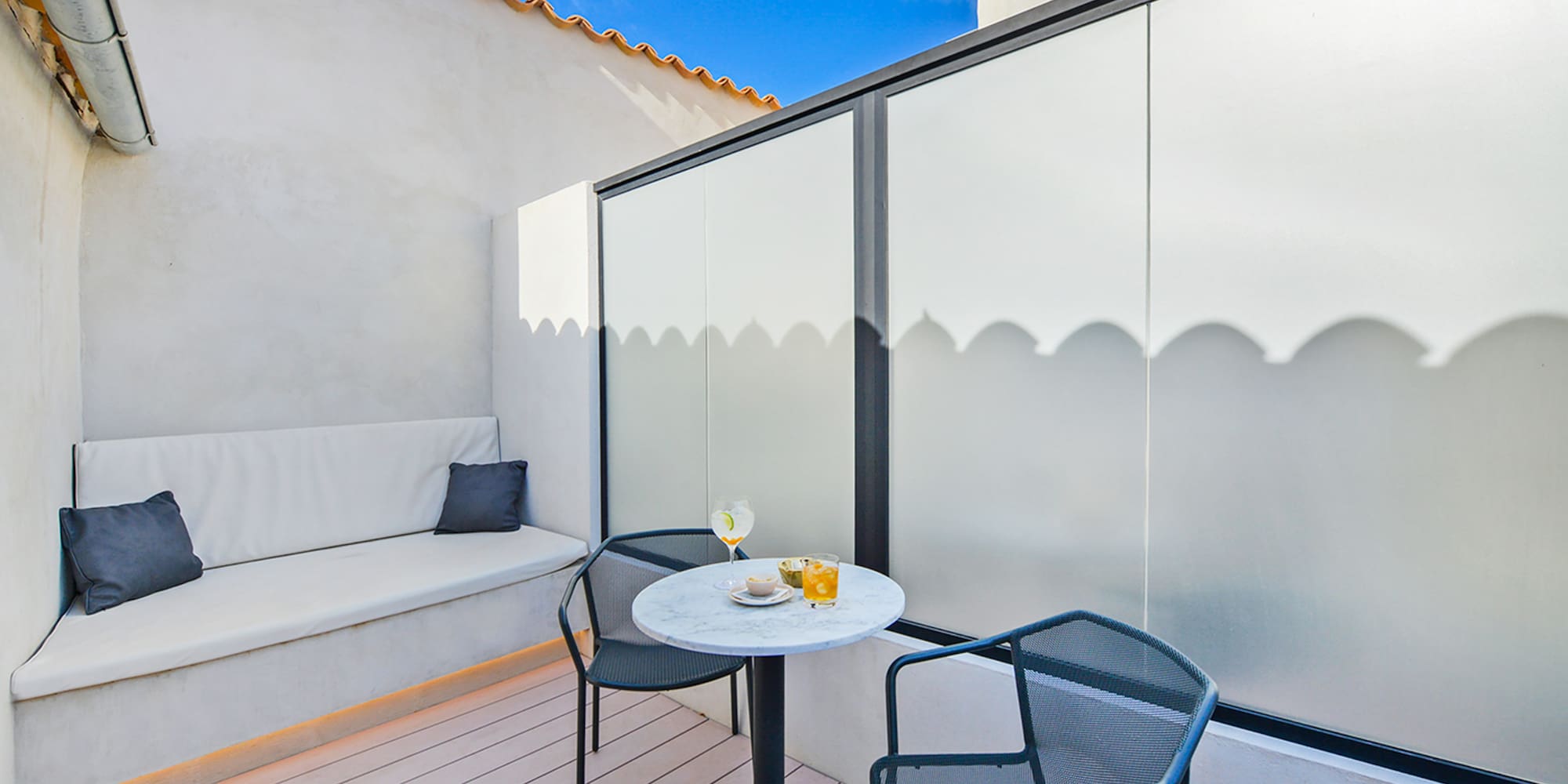a table and chairs on a patio