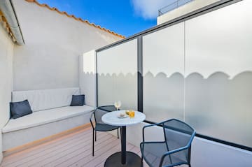 a table and chairs on a patio