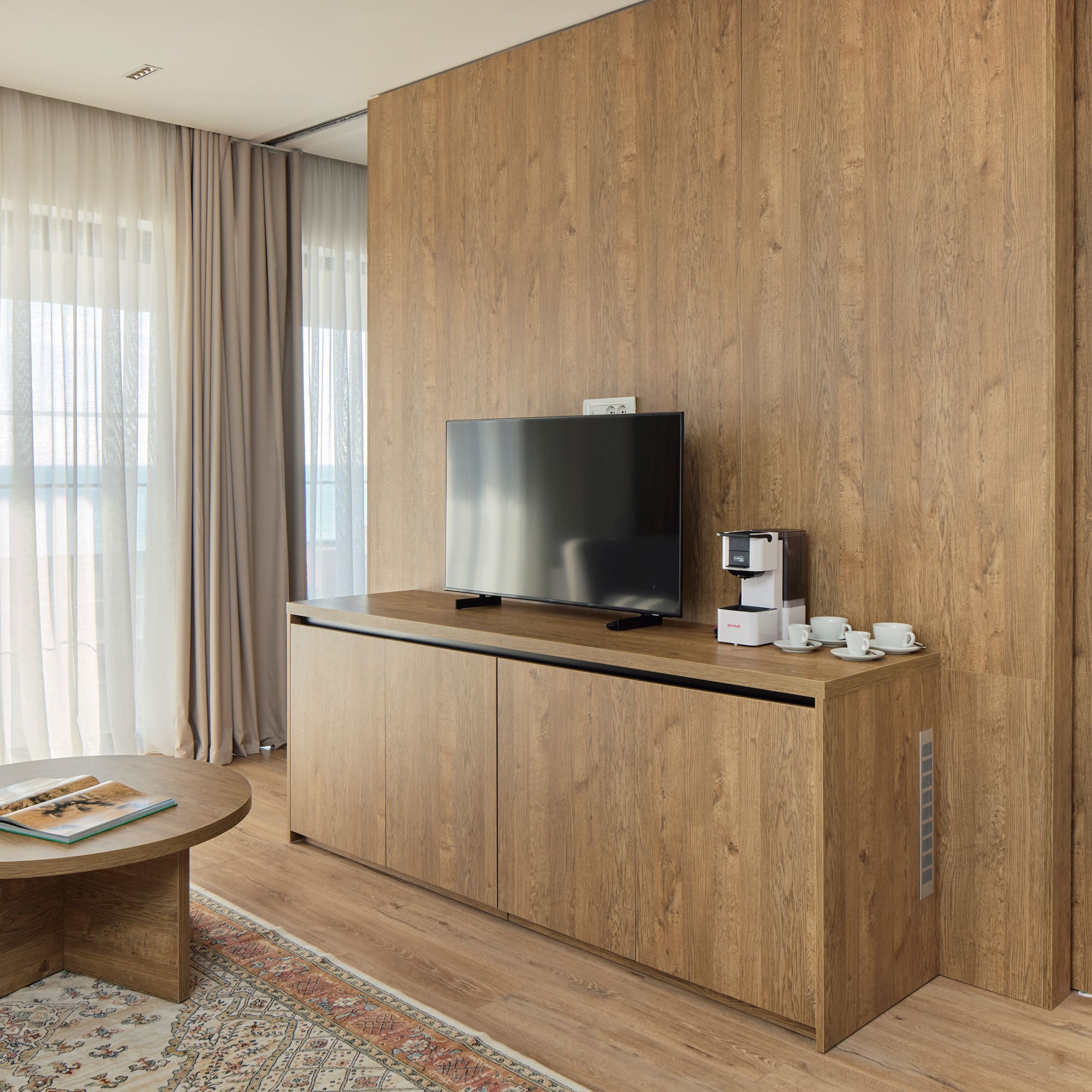 a tv on a table in a room