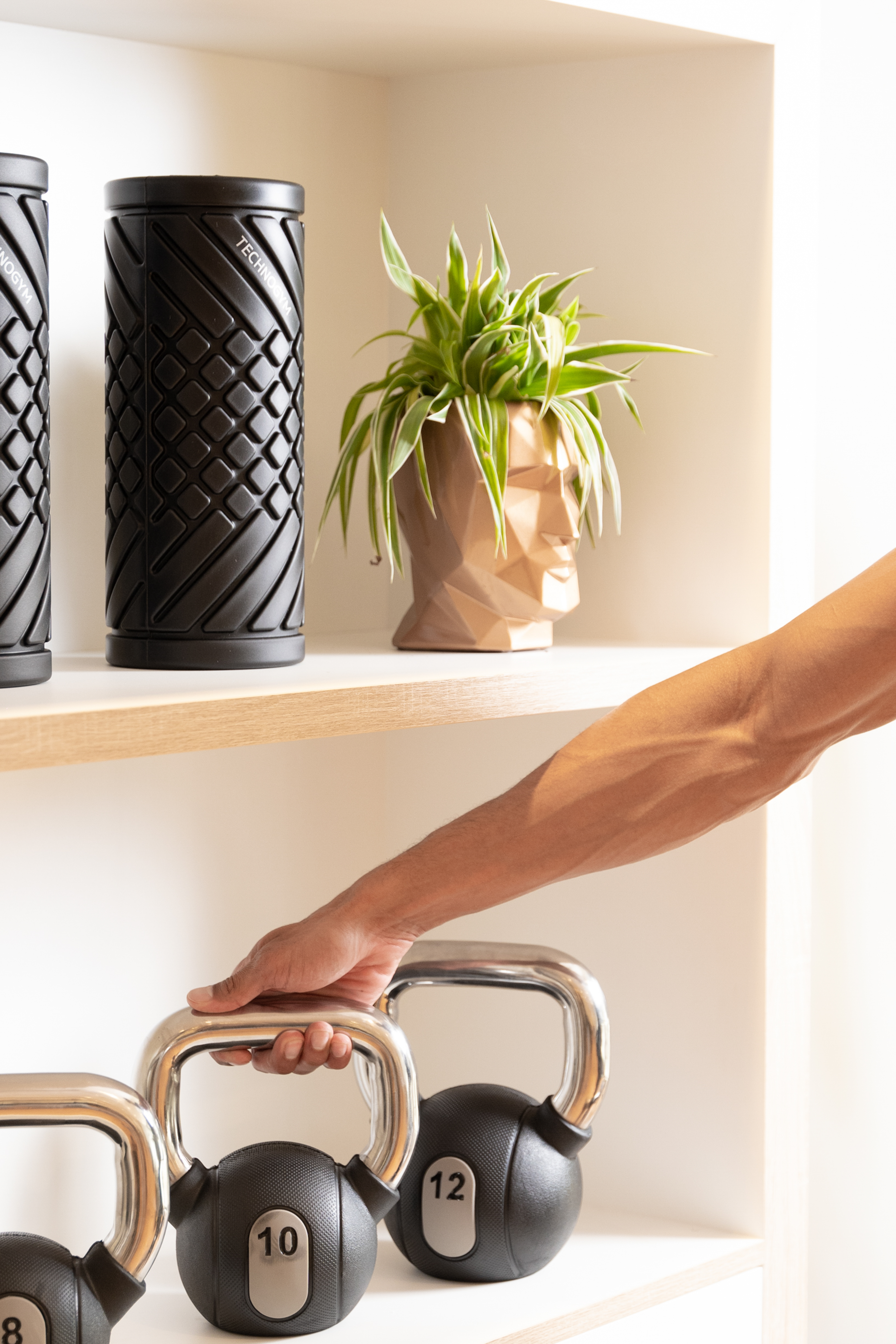 a person's hand on a metal bar