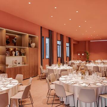 a room with tables and chairs