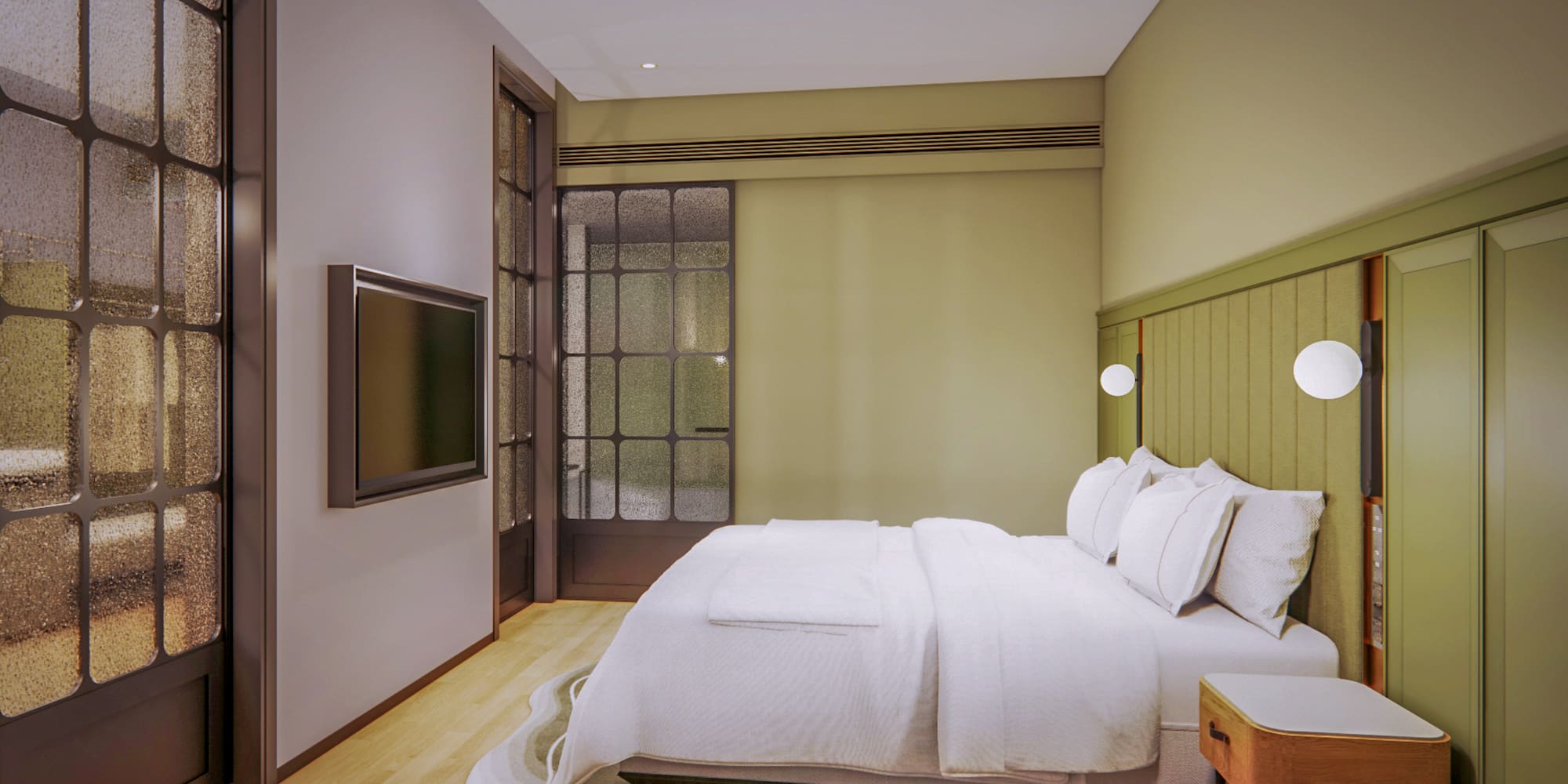 a bed with a tv in a room