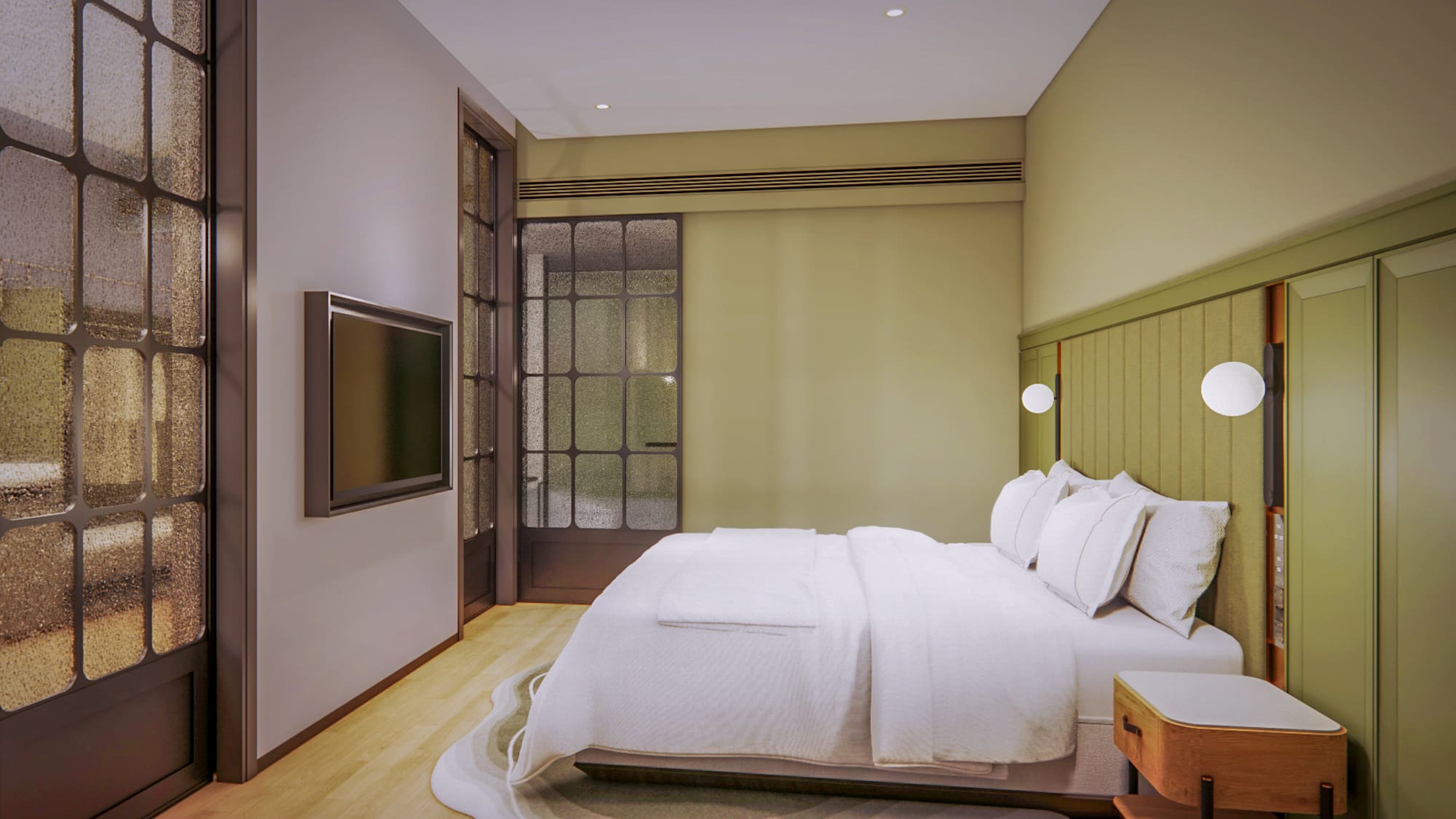 a bed with a tv in a room