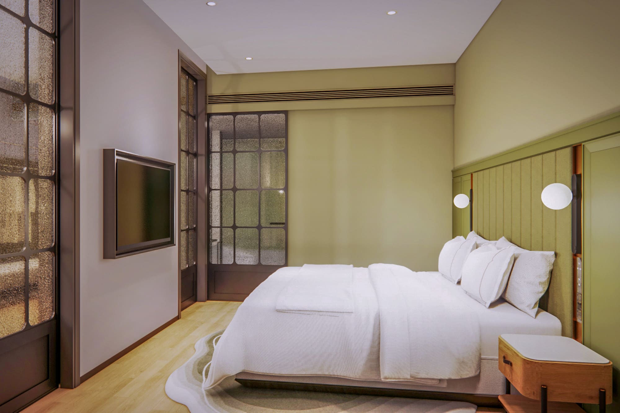 a bed with a tv in a room