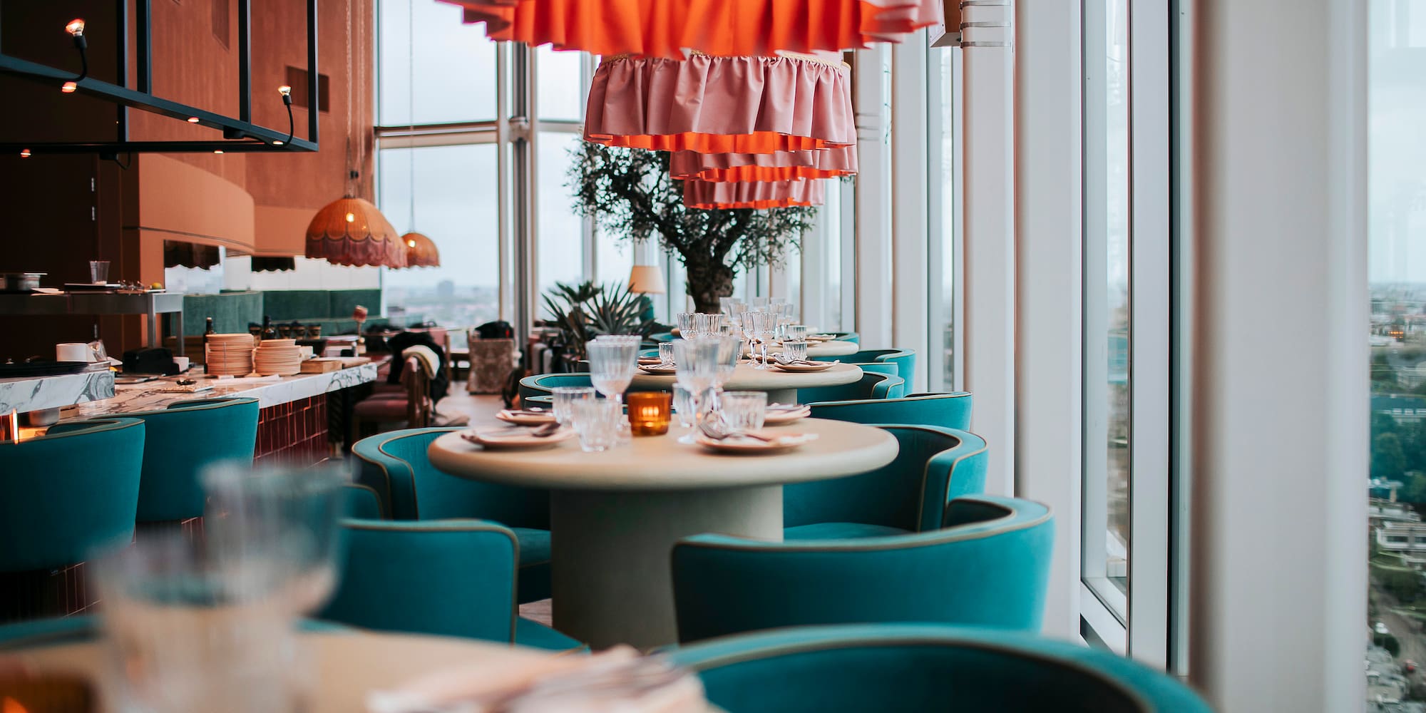 a restaurant with tables and chairs