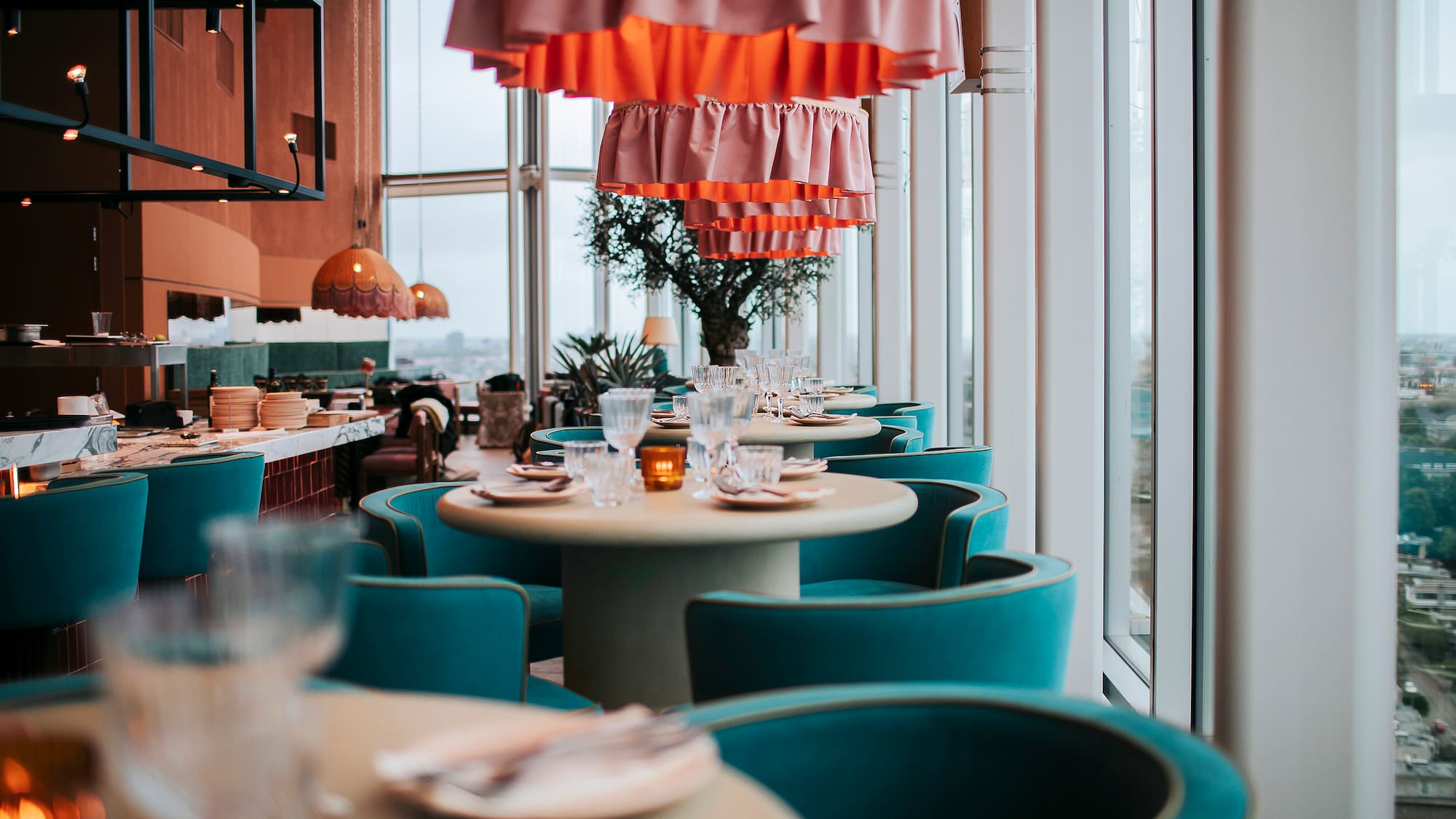 a restaurant with tables and chairs