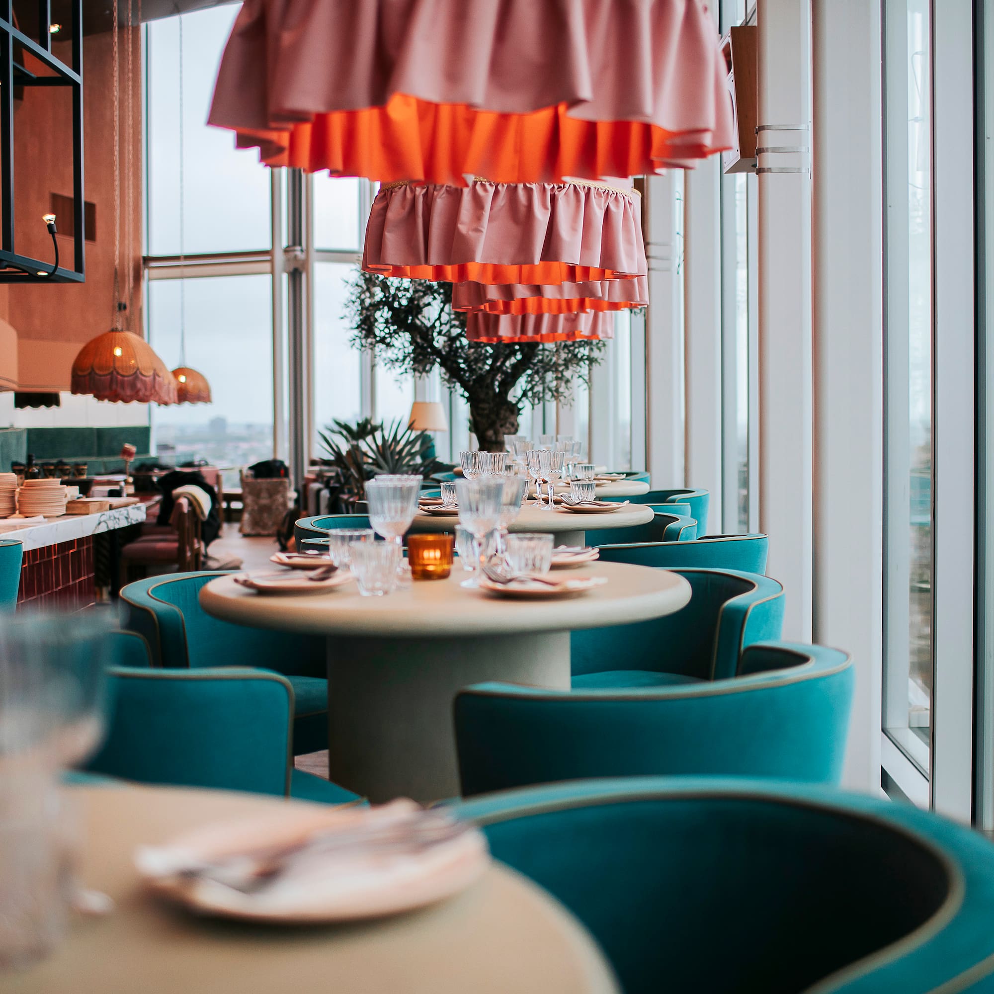 a restaurant with tables and chairs