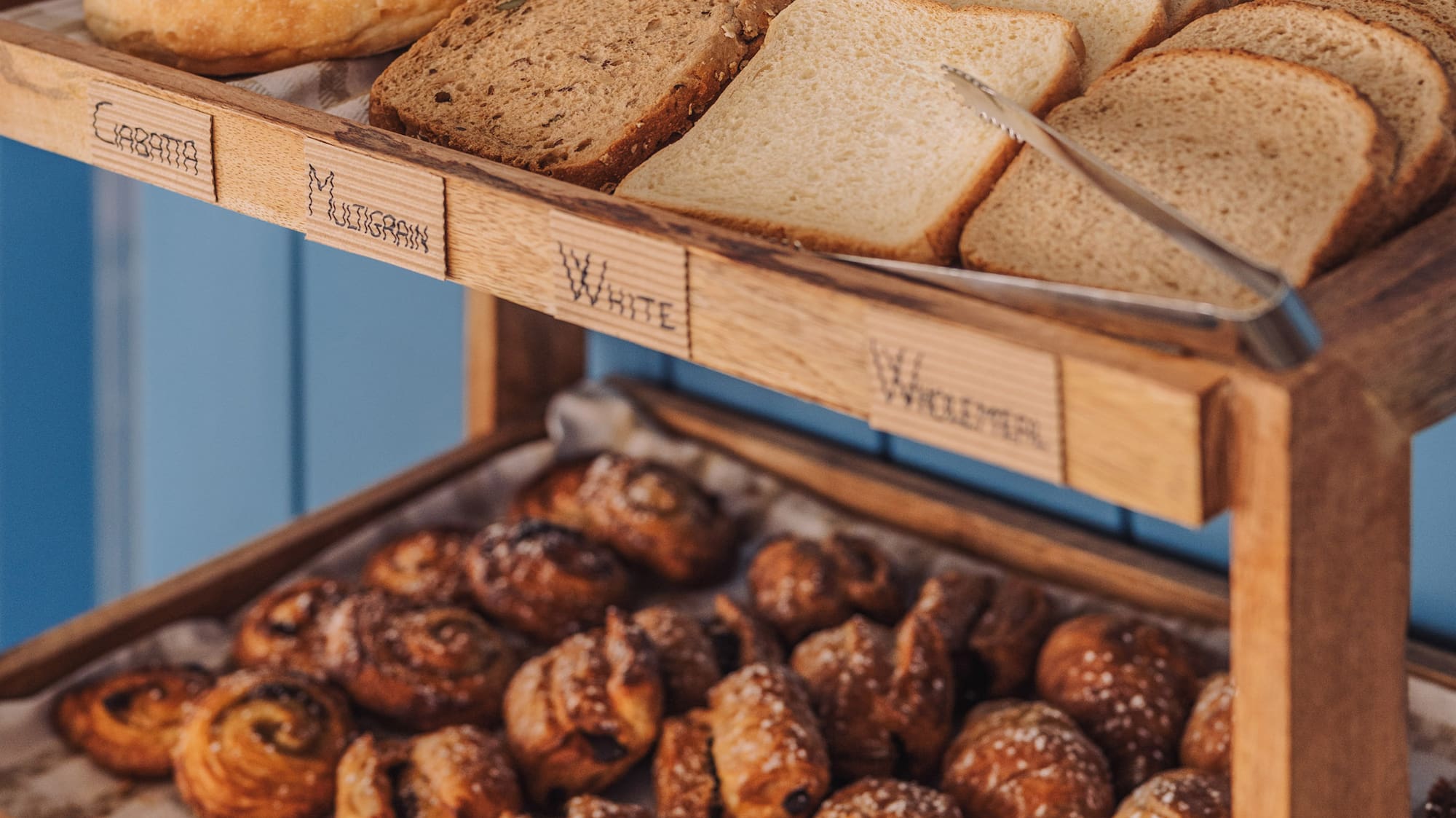 a tray of bread and pastries