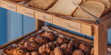 a tray of bread and pastries