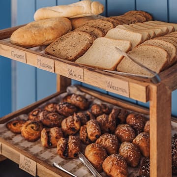 a tray of bread and pastries