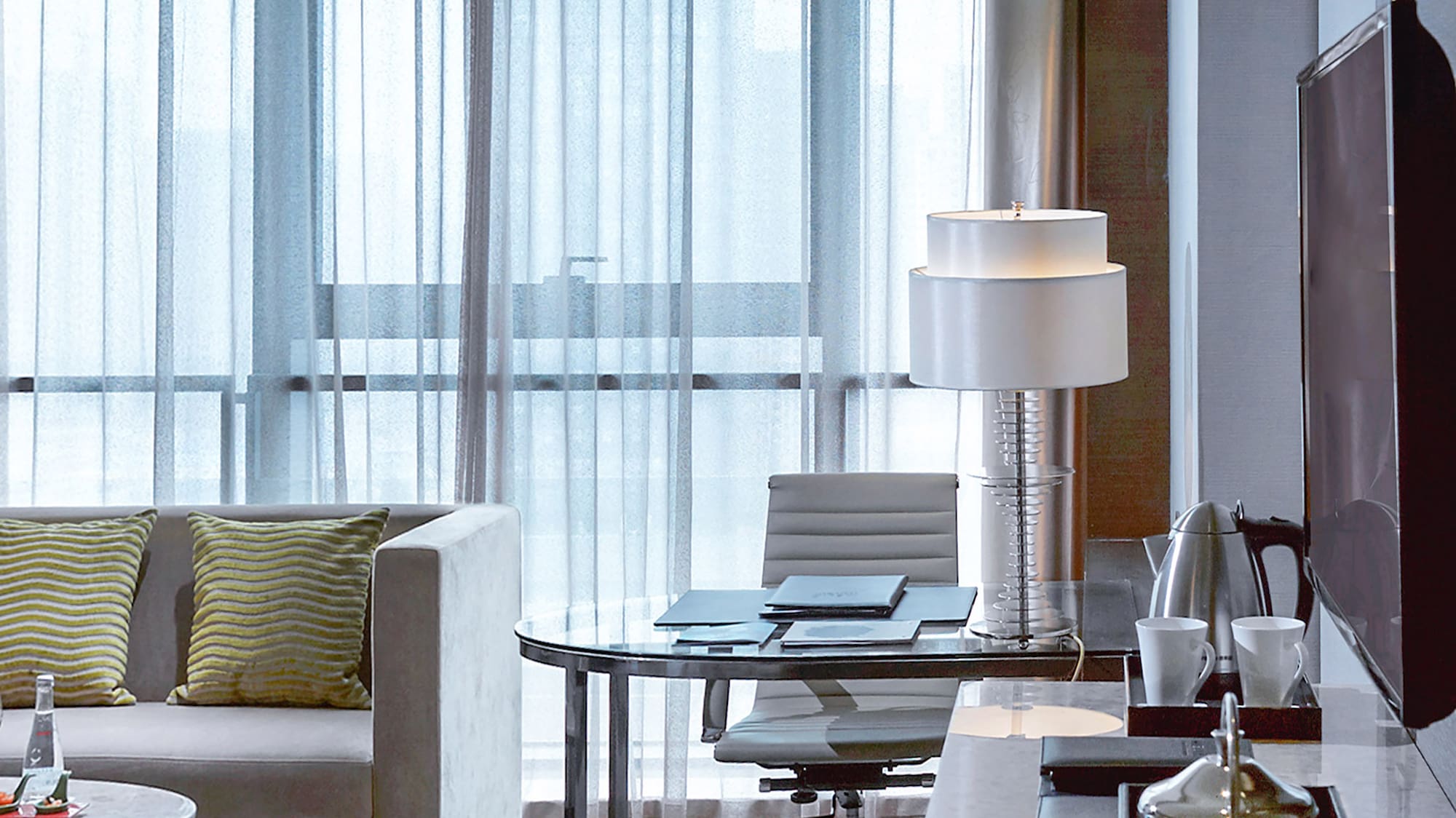 a room with a television and a table