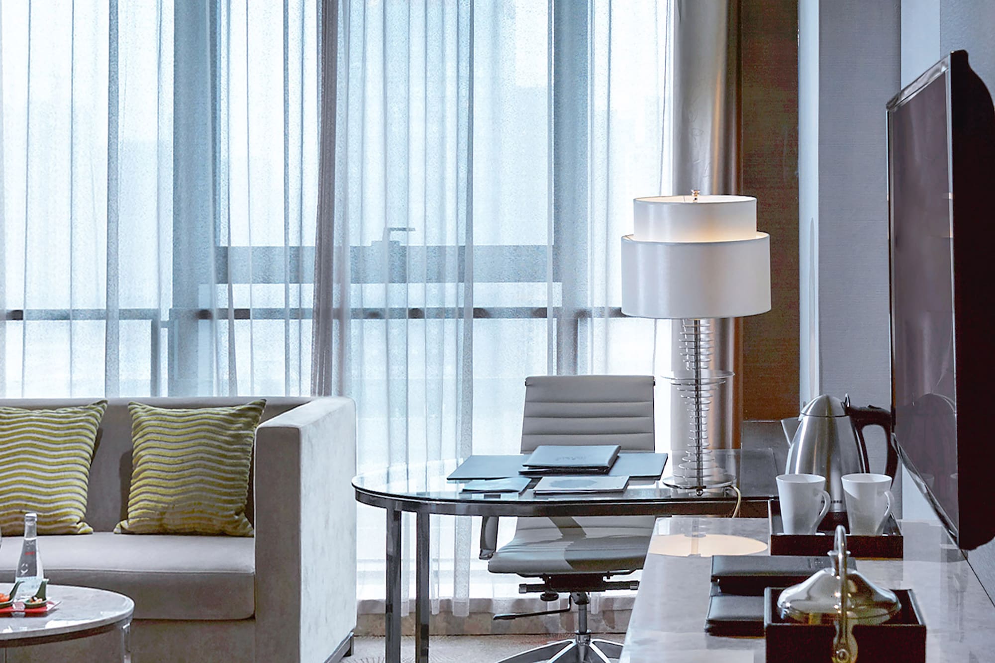 a room with a television and a table