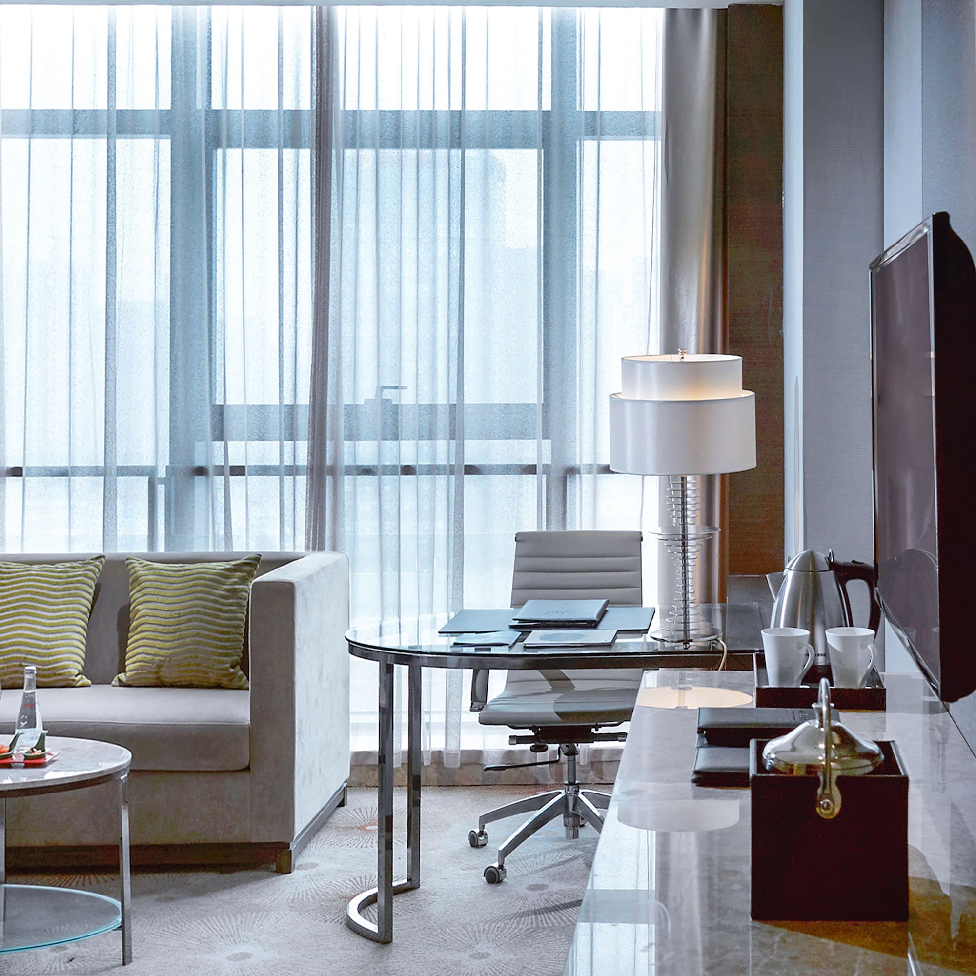 a room with a television and a table