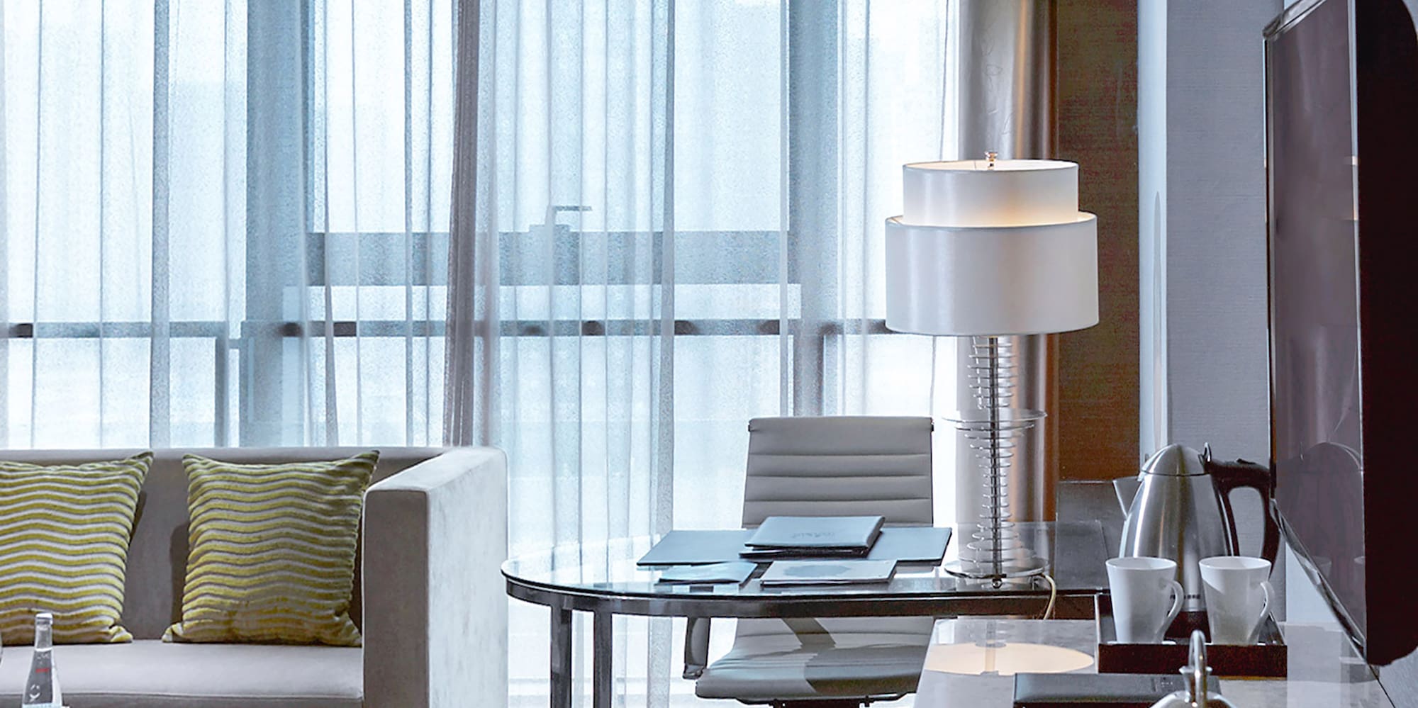 a room with a television and a table