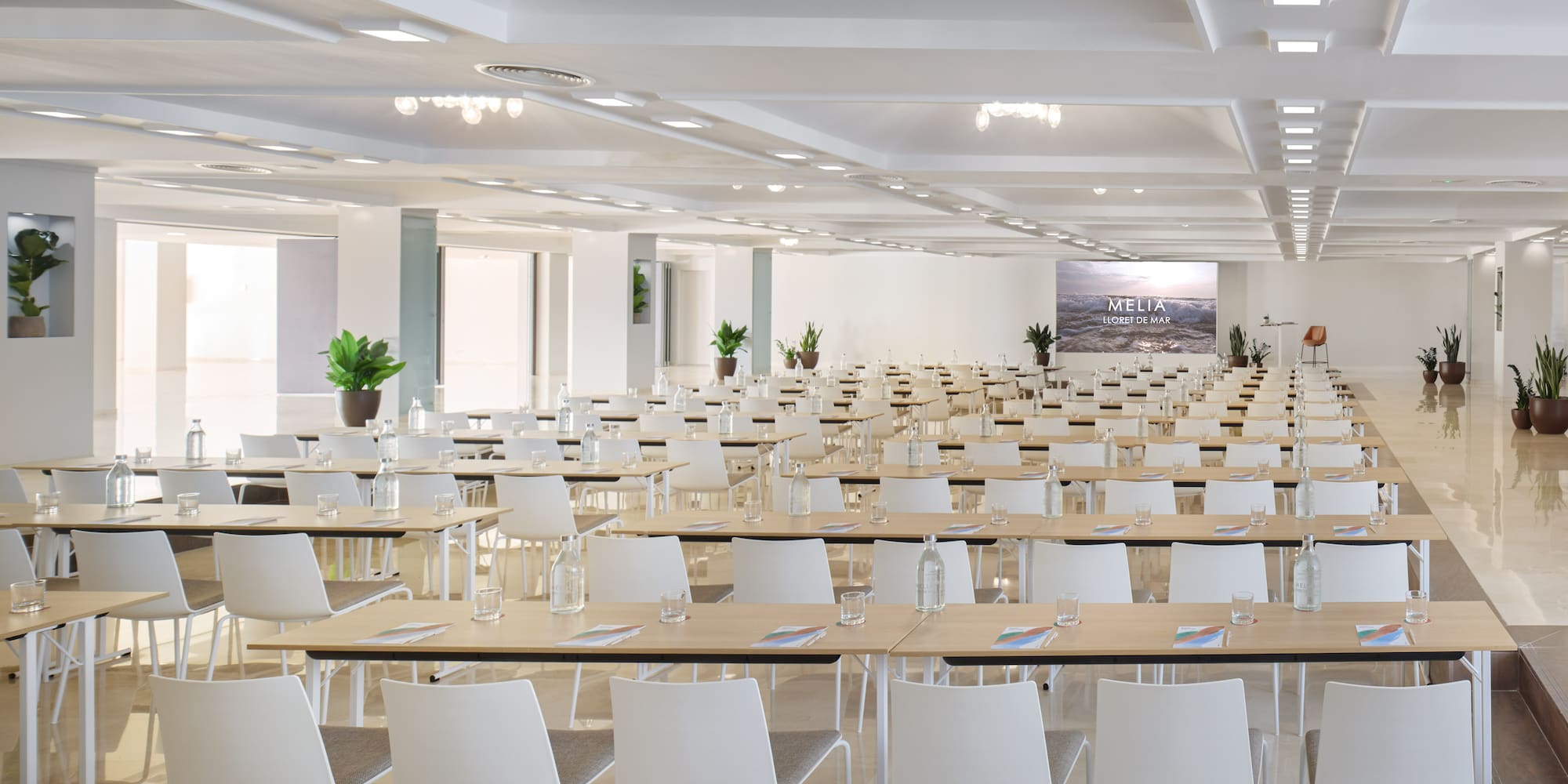 a large room with tables and chairs