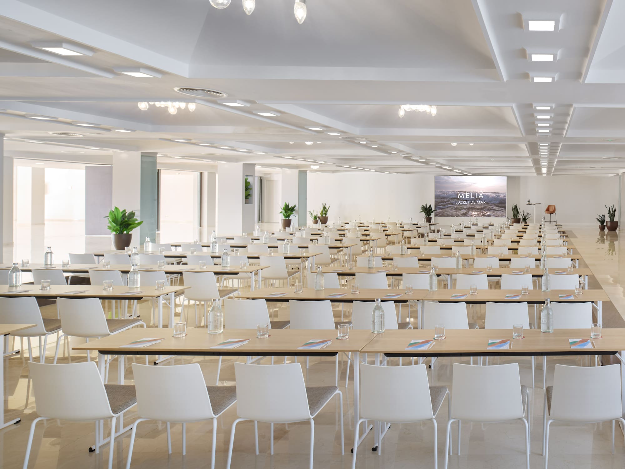 a large room with tables and chairs
