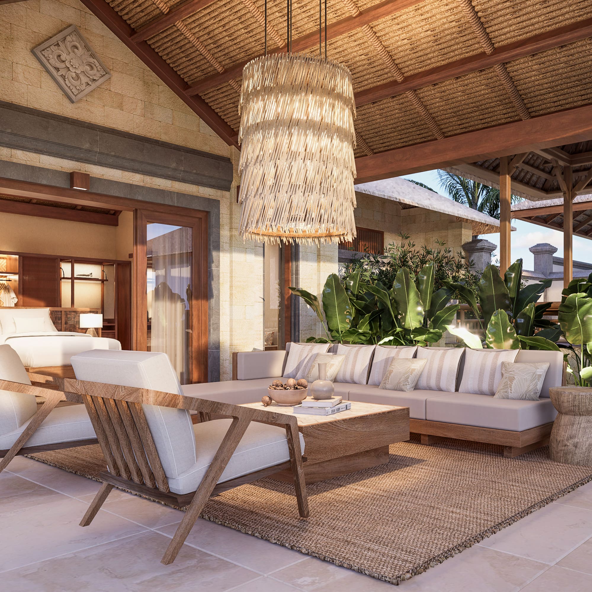 a living room with a large chandelier and a couch