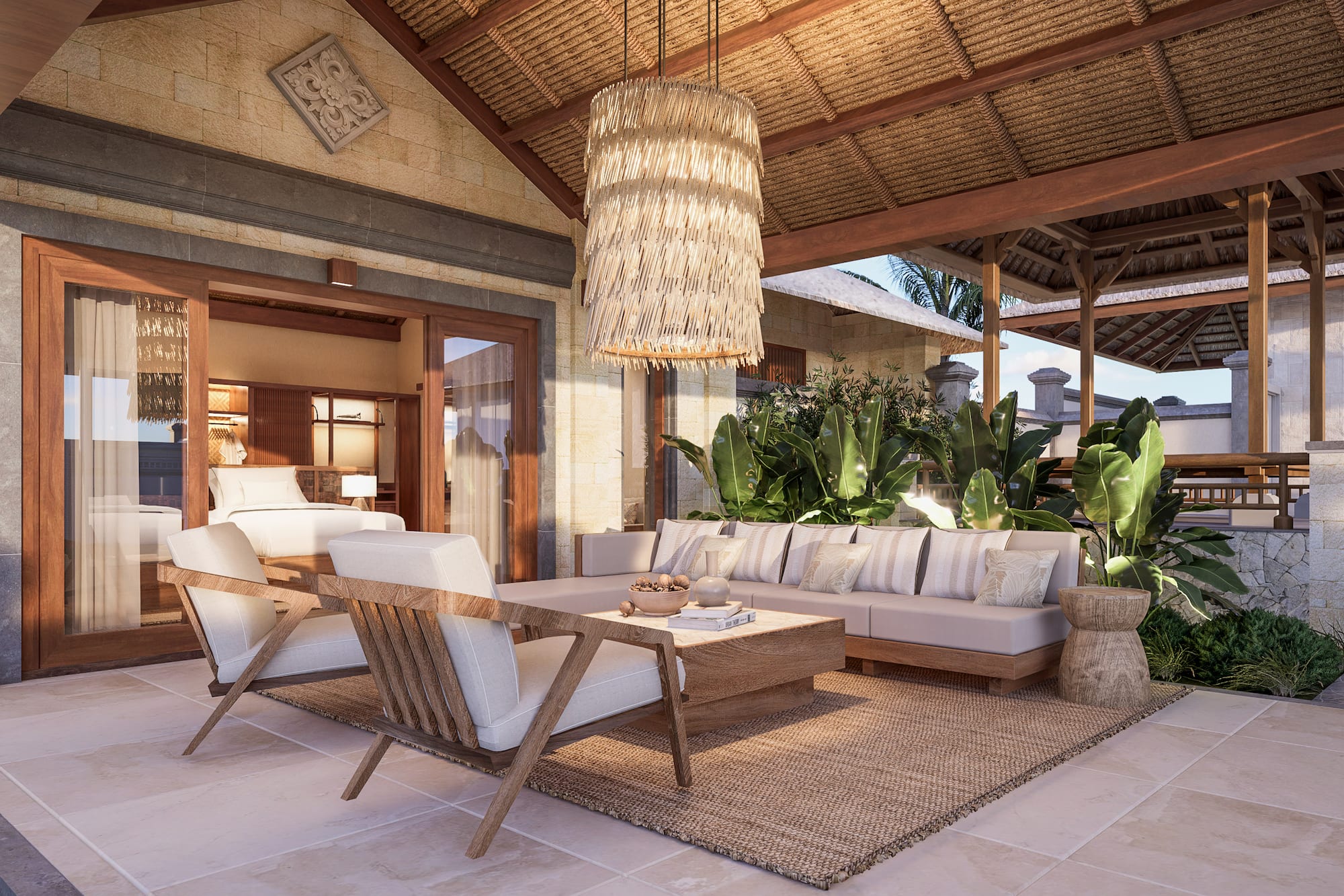 a living room with a large chandelier and a couch