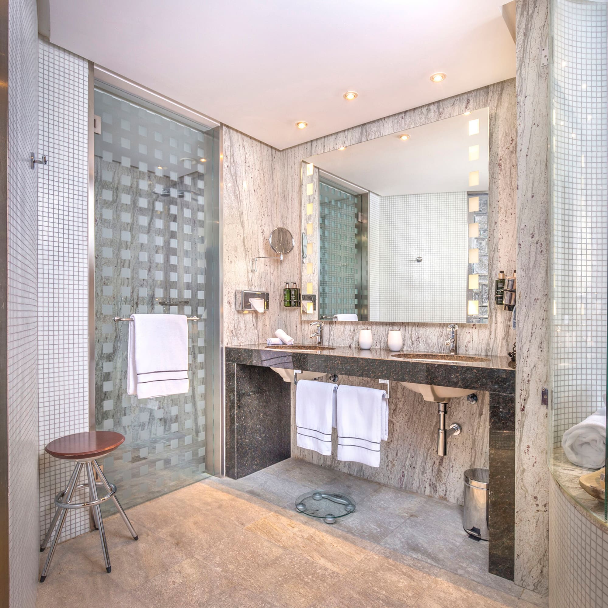 a bathroom with a mirror and sink