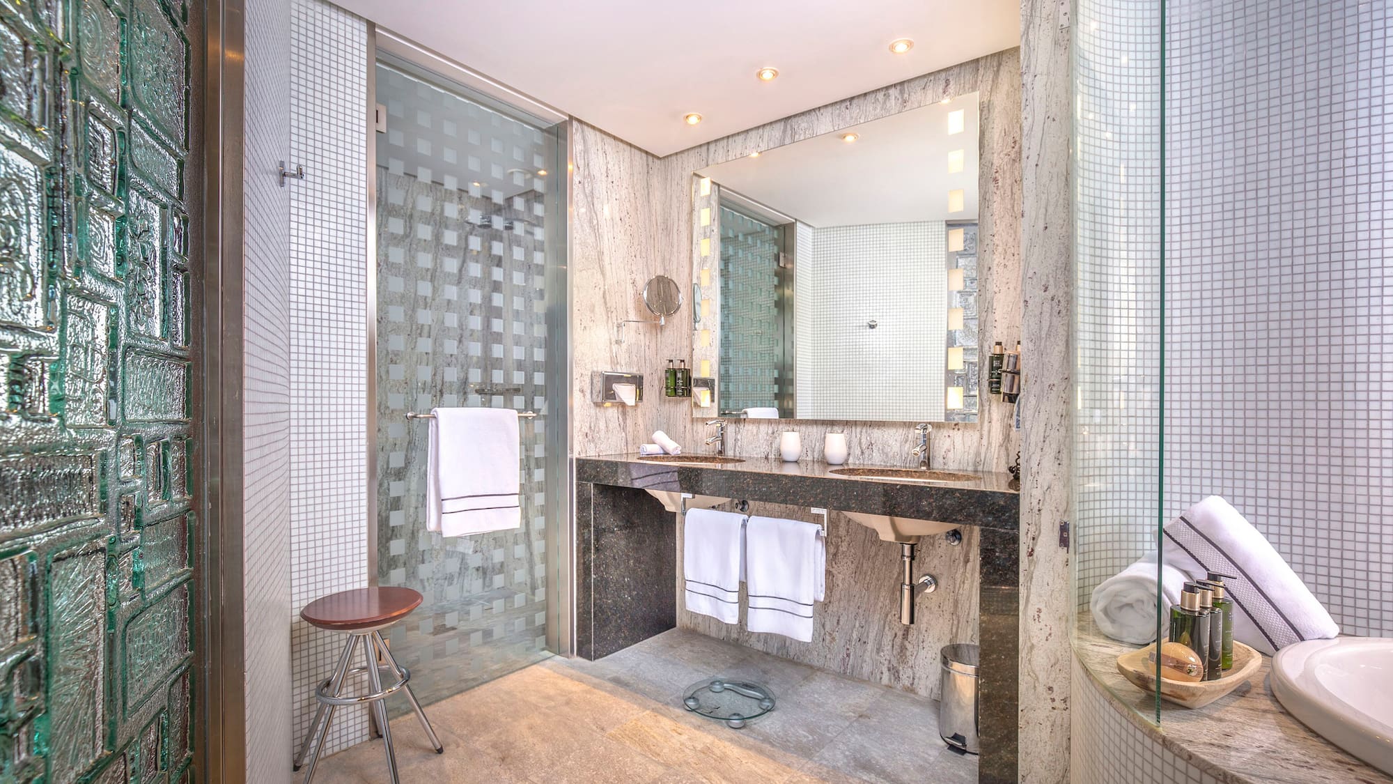 a bathroom with a mirror and sink