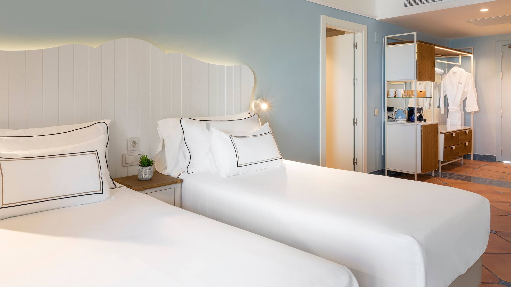 two beds in a hotel room