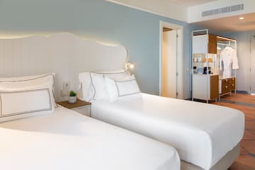 two beds in a hotel room