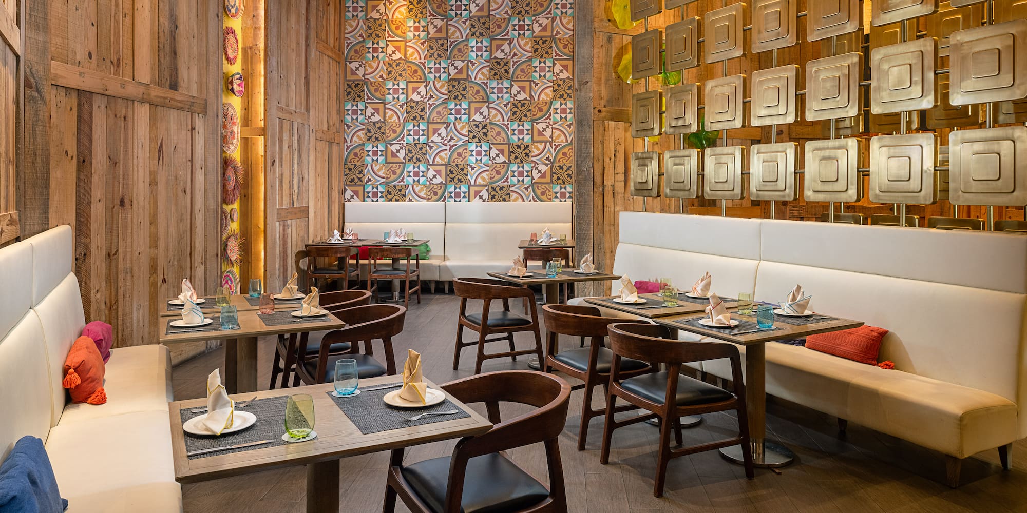 a restaurant with tables and benches