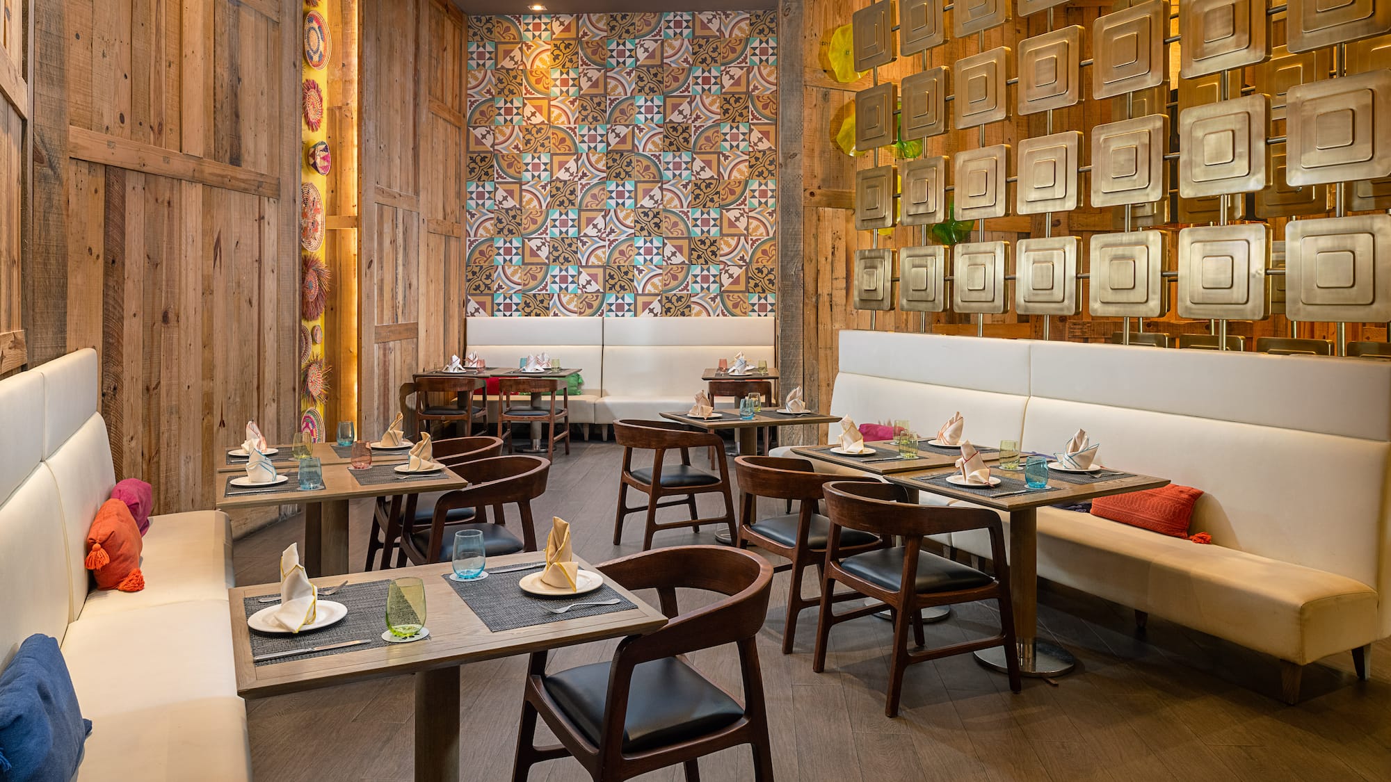 a restaurant with tables and benches