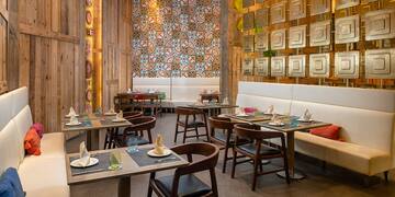 a restaurant with tables and benches