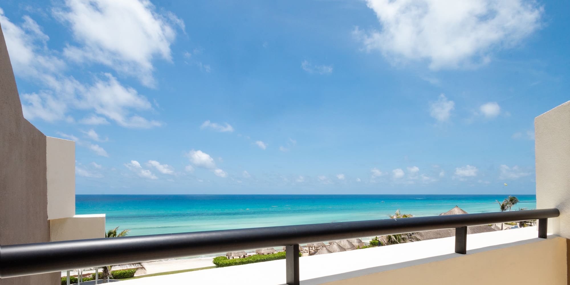 a balcony overlooking the ocean